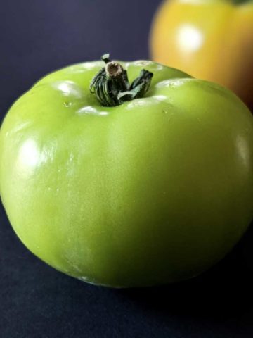 Close up photo of green tomato