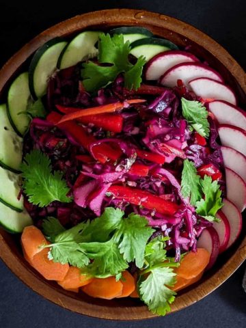 Overhead photo of a bowl of red cabbage salad