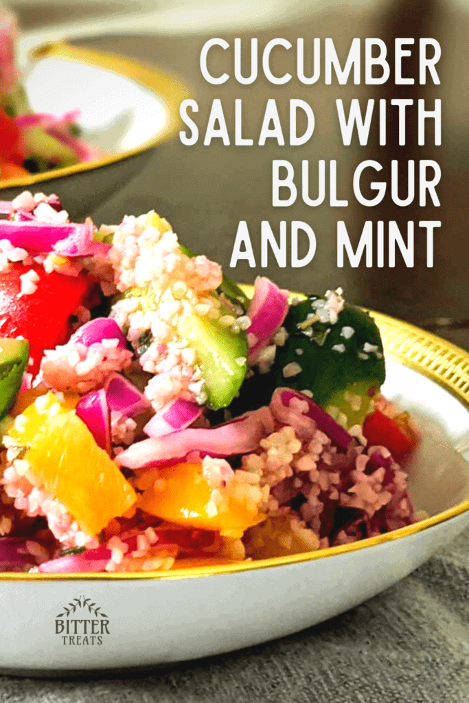 Close up photo of a bowl of cucumber salad with bulgur and mint