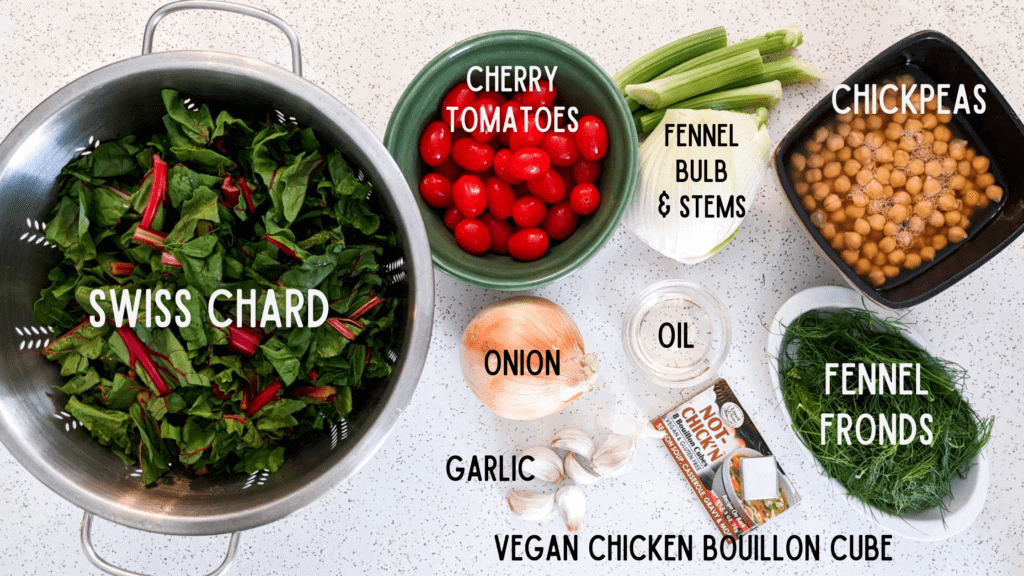 Overhead photo of ingredients with labels: Swiss chard, cherry tomatoes, onion, garlic, vegan chicken bouillon, oil, fennel, chickpeas