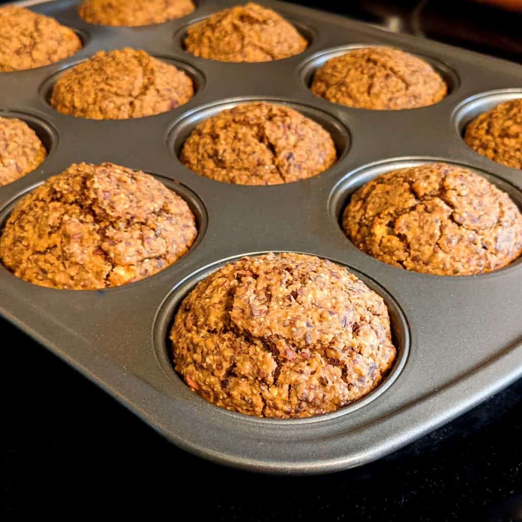 Photo of vegan cornbread muffins in pan after baking