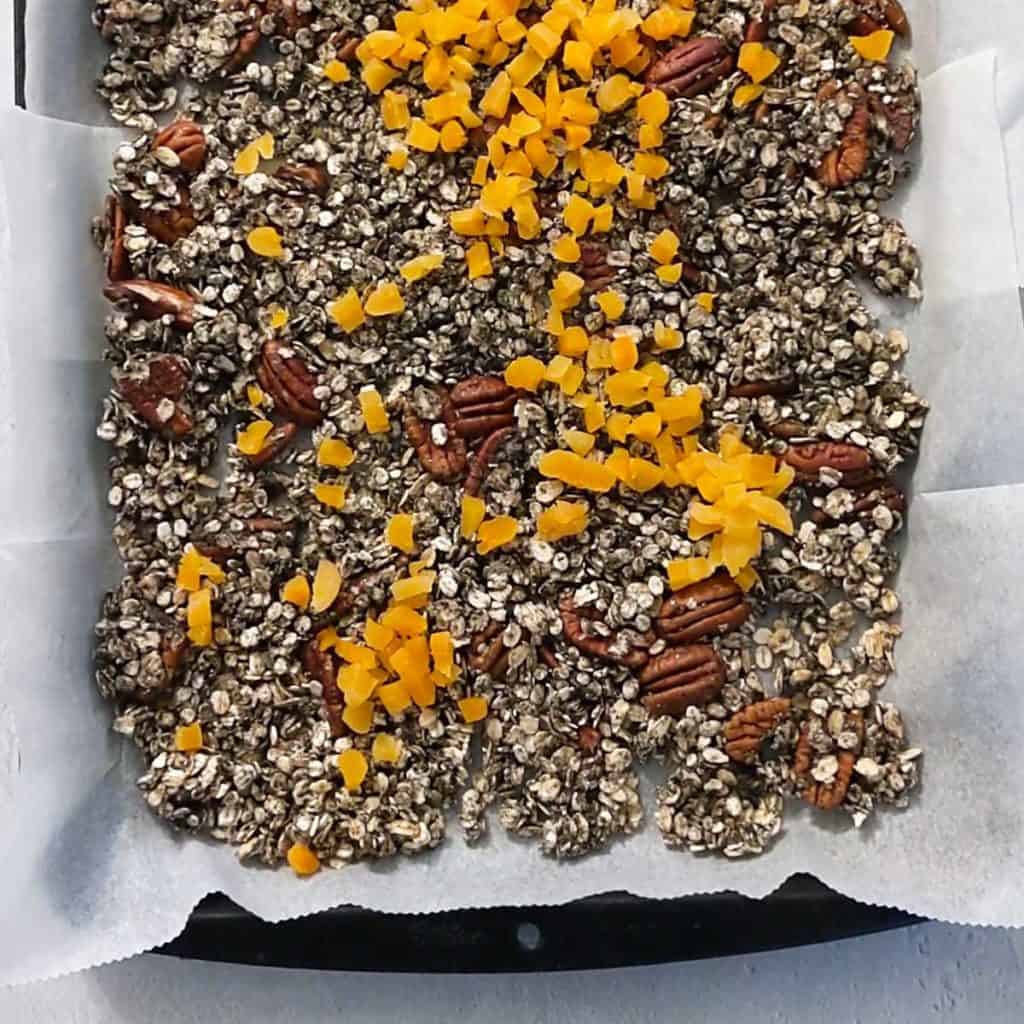 photo of adding apricots to granola after baking