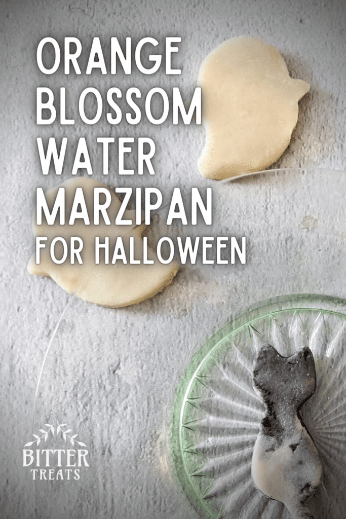 pinterest graphic showing overhead photo of ghost and cat shaped marzipan pieces text reads orange blossom water marzipan for halloween