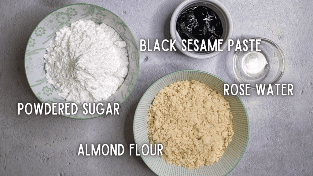 photo of labeled ingredients for black sesame marzipan: powdered sugar, almond flour, black sesame paste, rose water