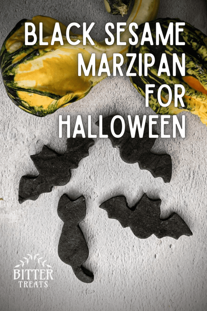 pinterest graphic showing overhead photo of black bat and cat shaped marzipan pieces text reads black sesame marzipan for halloween
