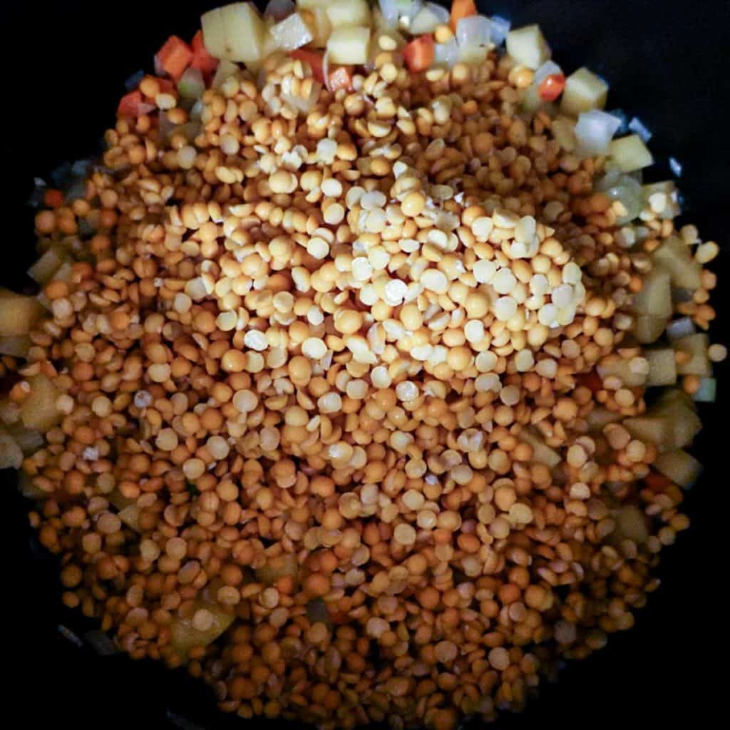 photo of potatoes and dried peas being added to split pea soup